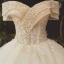 High-end Champagne Bridal Wedding Dresses 2020 Ball Gown Off-The-Shoulder Short Sleeve Backless Appliques Flower Beading Sequins Glitter Tulle Floor-Length / Long Ruffle
