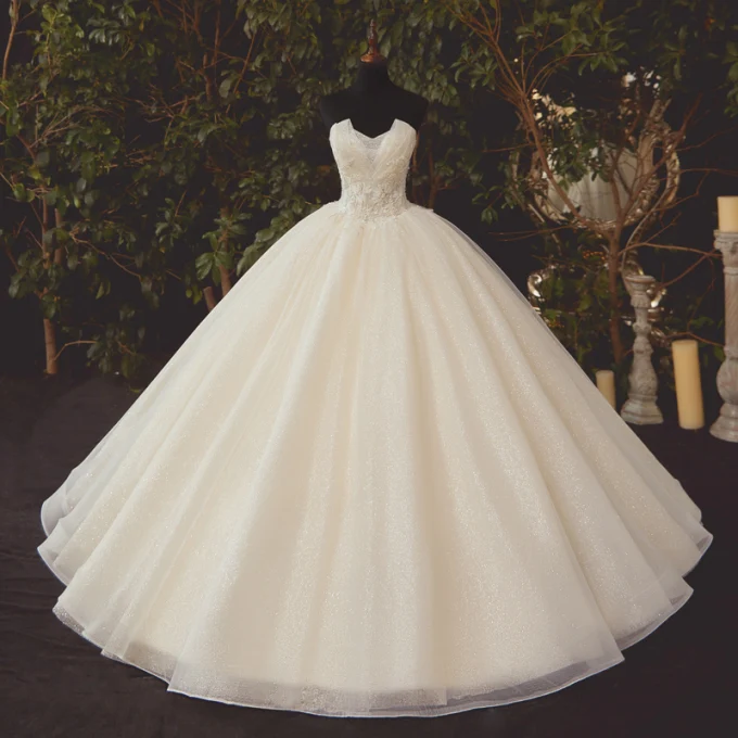 High End Champagne Bryllups Brudekjoler 2020 Ballkjole Kjæreste Uten Ermer Ryggløse Paljetter Håndlaget Beading Glitter Tyll Lange Buste