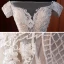 Haut de Gamme Champagne Transparentes La Mariée Robe De Mariée 2020 Trompette / Sirène De l'épaule Manches Courtes Dos Nu Appliques En Dentelle Perlage Perle Tribunal Train Volants