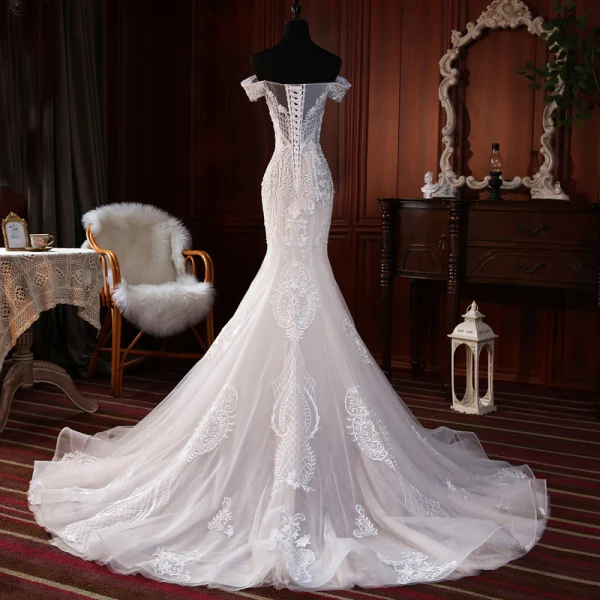 Haut de Gamme Champagne Transparentes La Mariée Robe De Mariée 2020 Trompette / Sirène De l'épaule Manches Courtes Dos Nu Appliques En Dentelle Perlage Perle Tribunal Train Volants