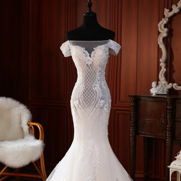 Haut de Gamme Champagne Transparentes La Mariée Robe De Mariée 2020 Trompette / Sirène De l'épaule Manches Courtes Dos Nu Appliques En Dentelle Perlage Perle Tribunal Train Volants