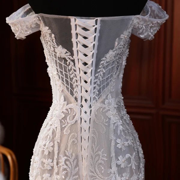 Haut de Gamme Champagne Transparentes La Mariée Robe De Mariée 2020 Trompette / Sirène De l'épaule Manches Courtes Dos Nu Appliques En Dentelle Perlage Perle Tribunal Train Volants
