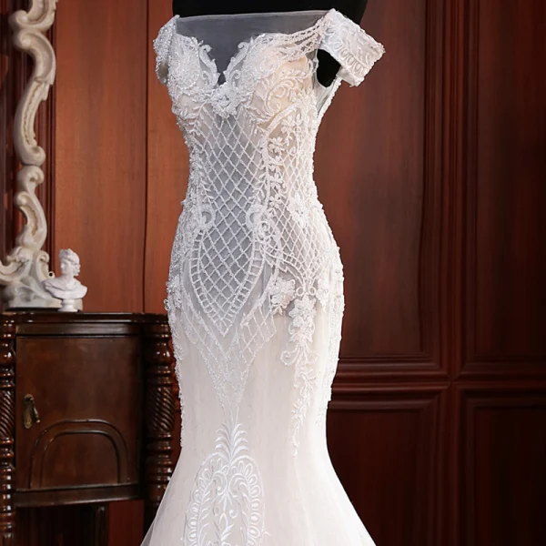 Haut de Gamme Champagne Transparentes La Mariée Robe De Mariée 2020 Trompette / Sirène De l'épaule Manches Courtes Dos Nu Appliques En Dentelle Perlage Perle Tribunal Train Volants
