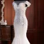 Haut de Gamme Champagne Transparentes La Mariée Robe De Mariée 2020 Trompette / Sirène De l'épaule Manches Courtes Dos Nu Appliques En Dentelle Perlage Perle Tribunal Train Volants