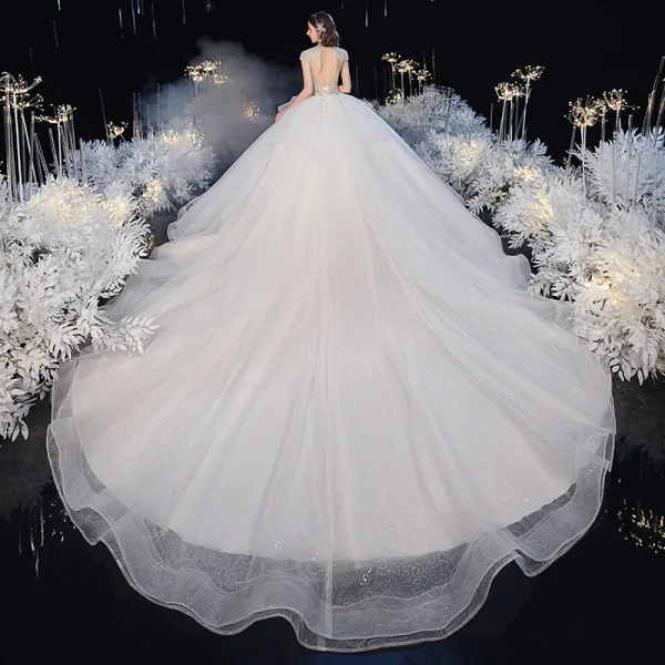 Luxury / Gorgeous Ivory See-through Bridal Wedding Dresses 2020 Ball Gown High Neck Short Sleeve Backless Beading Glitter Tulle Royal Train Ruffle