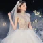 Luxury / Gorgeous Ivory See-through Bridal Wedding Dresses 2020 Ball Gown High Neck Short Sleeve Backless Beading Glitter Tulle Royal Train Ruffle
