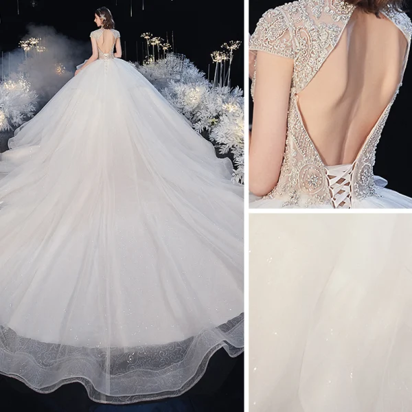Luxury / Gorgeous Ivory See-through Bridal Wedding Dresses 2020 Ball Gown High Neck Short Sleeve Backless Beading Glitter Tulle Royal Train Ruffle