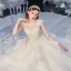 Vintage / Originale Champagne Transparentes La Mariée Robe De Mariée 2020 Robe Boule Col Haut Sans Manches Dos Nu Appliques Paillettes Perlage Glitter Tulle Cathedral Train Volants