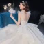 Vintage / Originale Champagne Transparentes La Mariée Robe De Mariée 2020 Robe Boule Col Haut Sans Manches Dos Nu Appliques Paillettes Perlage Glitter Tulle Cathedral Train Volants