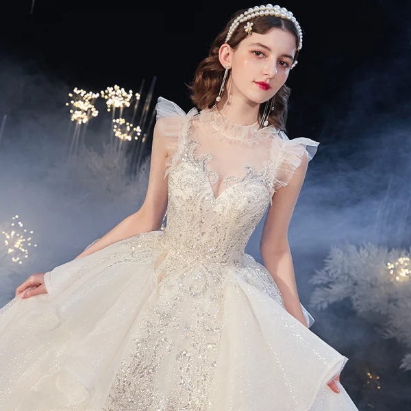 Vintage / Originale Champagne Transparentes La Mariée Robe De Mariée 2020 Robe Boule Col Haut Sans Manches Dos Nu Appliques Paillettes Perlage Glitter Tulle Cathedral Train Volants
