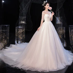 Elegant Ivory See Through Bridal Wedding Dresses 2020 Ball Gown Scoop Neck 1 2 Sleeves Backless Beading Glitter Tulle Chapel Train Ruffle