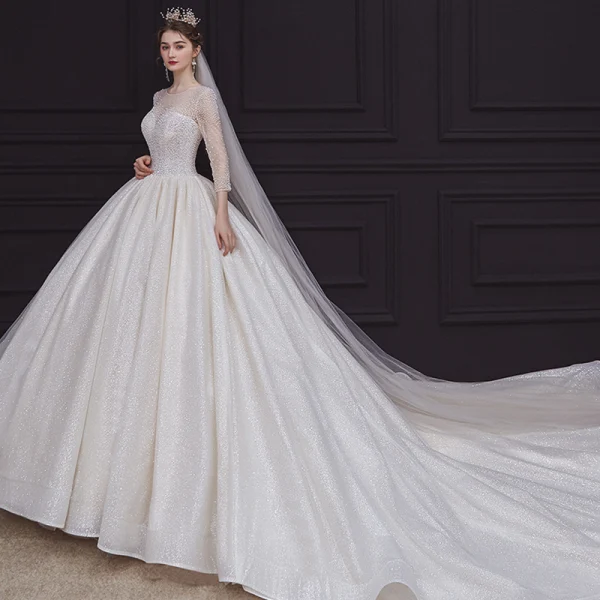 High-end Champagne See-through Bridal Wedding Dresses 2020 Ball Gown Scoop Neck 3/4 Sleeve Backless Beading Glitter Tulle Cathedral Train Ruffle