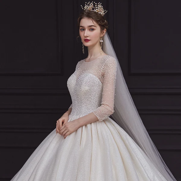 High-end Champagne See-through Bridal Wedding Dresses 2020 Ball Gown Scoop Neck 3/4 Sleeve Backless Beading Glitter Tulle Cathedral Train Ruffle