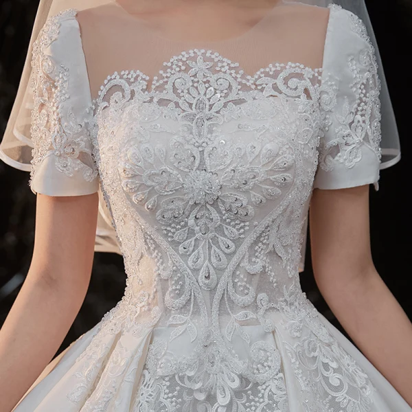 Vintage / Retro White Satin Bridal Wedding Dresses 2020 Ball Gown See-through Scoop Neck Short Sleeve Backless Beading Pierced Appliques Lace Cathedral Train