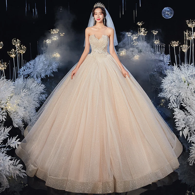 Beste Champagne Bryllups Brudekjoler 2020 Ballkjole Kjæreste Uten Ermer Ryggløse Appliques Blonder Beading Glitter Tyll Lange Buste