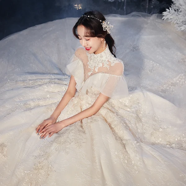 Vintage / Retro Champagne Bridal Wedding Dresses 2020 Ball Gown See-through High Neck Short Sleeve Backless Beading Appliques Lace Cathedral Train Ruffle