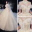 Vintage / Retro Champagne Bridal Wedding Dresses 2020 Ball Gown See-through High Neck Short Sleeve Backless Beading Appliques Lace Cathedral Train Ruffle