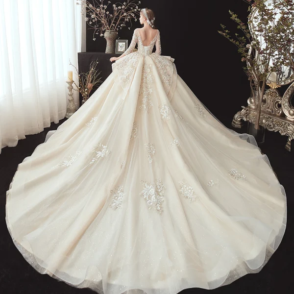 Best Champagne See-through Bridal Wedding Dresses 2020 Ball Gown Scoop Neck 3/4 Sleeve Backless Flower Appliques Lace Beading Glitter Tulle Chapel Train Ruffle