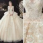 Best Champagne See-through Bridal Wedding Dresses 2020 Ball Gown Scoop Neck 3/4 Sleeve Backless Flower Appliques Lace Beading Glitter Tulle Chapel Train Ruffle