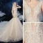 Élégant Champagne La Mariée Robe De Mariée 2020 Trompette / Sirène Transparentes Col v profond Sans Manches Dos Nu Appliques En Dentelle Paillettes Perlage Chapel Train