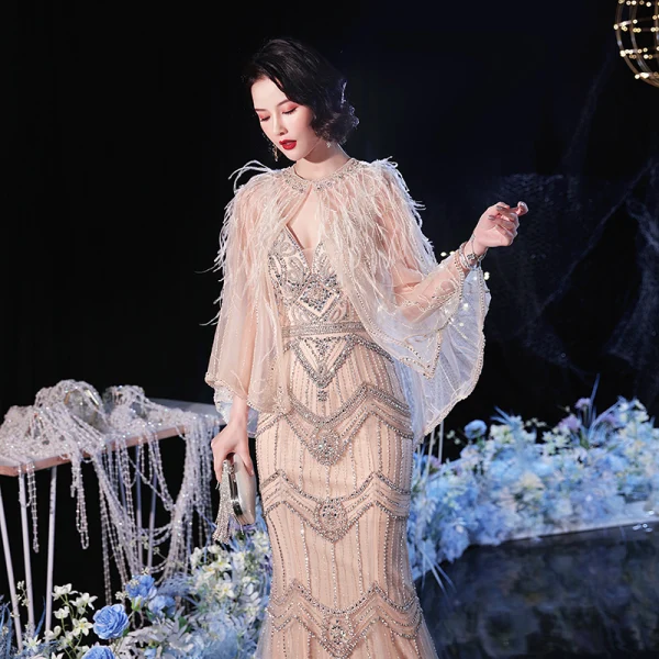 Luxe Champagne Robe De Soirée Avec Châle 2020 Trompette / Sirène Col v profond Sans Manches Fait main Perlage Train De Balayage Dos Nu Robe De Ceremonie