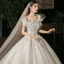 Elegant Champagne Bridal Wedding Dresses 2020 Ball Gown Off-The-Shoulder Short Sleeve Backless Appliques Lace Beading Glitter Tulle Cathedral Train Ruffle