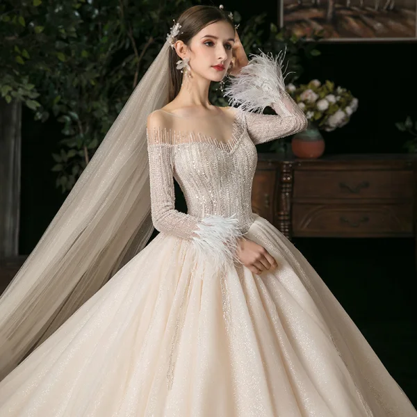 Beste Champagner Durchsichtige Hochzeits Brautkleider / Hochzeitskleider 2020 Ballkleid Rundhalsausschnitt Lange Ärmel Feder Rückenfreies Pailletten Perlenstickerei Glanz Tülle Kathedrale Schleppe Rüschen