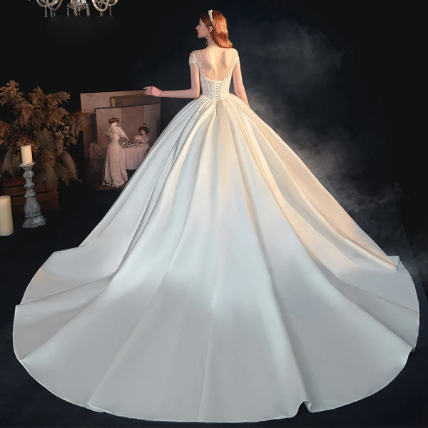 Illusion Ivory Satin See-through Bridal Wedding Dresses 2020 Ball Gown Scoop Neck Short Sleeve Backless Appliques Lace Beading Chapel Train Ruffle