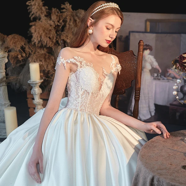 Illusion Ivory Satin See-through Bridal Wedding Dresses 2020 Ball Gown Scoop Neck Short Sleeve Backless Appliques Lace Beading Chapel Train Ruffle
