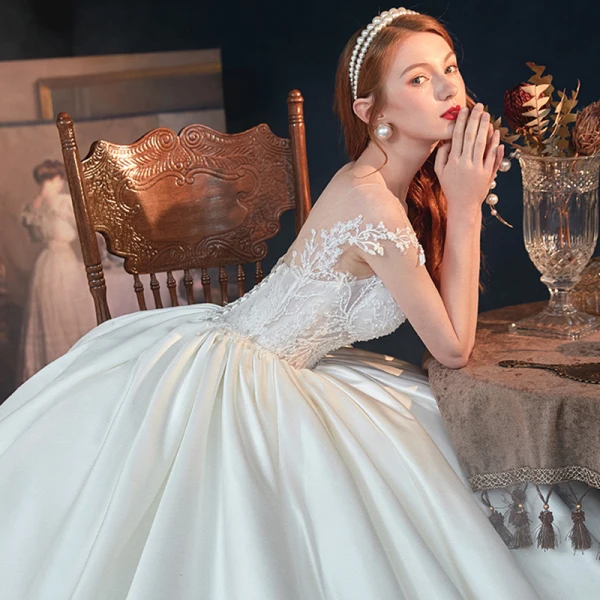 Illusion Ivory Satin See-through Bridal Wedding Dresses 2020 Ball Gown Scoop Neck Short Sleeve Backless Appliques Lace Beading Chapel Train Ruffle