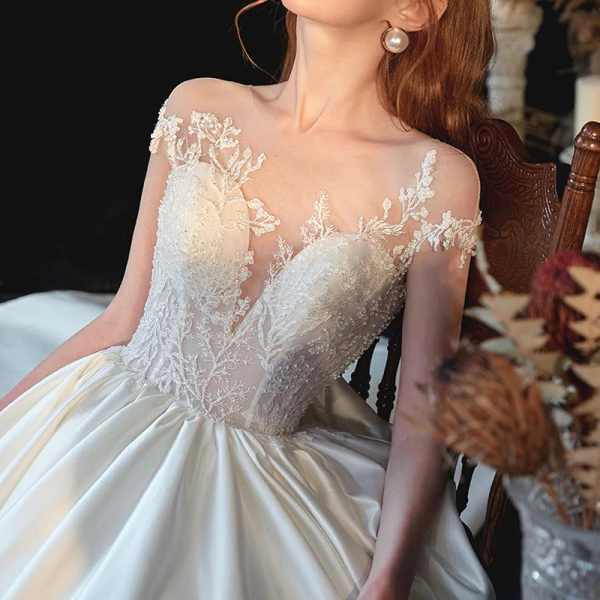 Illusion Ivory Satin See-through Bridal Wedding Dresses 2020 Ball Gown Scoop Neck Short Sleeve Backless Appliques Lace Beading Chapel Train Ruffle