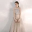 Elegante Champagner Abendkleider 2020 A Linie Bandeau Ärmellos Pailletten Perlenstickerei Lange Rüschen Rückenfreies Festliche Kleider