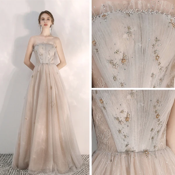 Elegante Champagner Abendkleider 2020 A Linie Bandeau Ärmellos Pailletten Perlenstickerei Lange Rüschen Rückenfreies Festliche Kleider