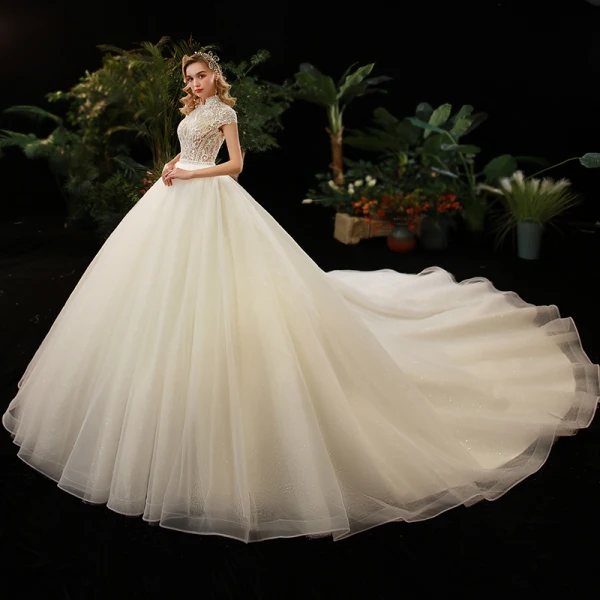 Illusion Champagne See-through Bridal Wedding Dresses 2020 Ball Gown High Neck Short Sleeve Backless Beading Glitter Tulle Cathedral Train