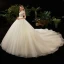 Illusion Champagne See-through Bridal Wedding Dresses 2020 Ball Gown High Neck Short Sleeve Backless Beading Glitter Tulle Cathedral Train