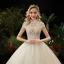Illusion Champagne See-through Bridal Wedding Dresses 2020 Ball Gown High Neck Short Sleeve Backless Beading Glitter Tulle Cathedral Train