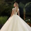 Illusion Champagne See-through Bridal Wedding Dresses 2020 Ball Gown High Neck Short Sleeve Backless Beading Glitter Tulle Cathedral Train