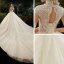 Illusion Champagne See-through Bridal Wedding Dresses 2020 Ball Gown High Neck Short Sleeve Backless Beading Glitter Tulle Cathedral Train