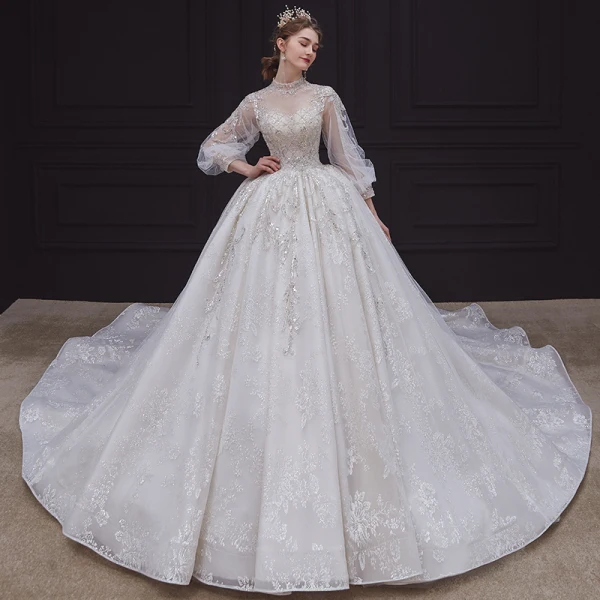 Style Victorien Ivoire Transparentes La Mariée Robe De Mariée 2020 Robe Boule Col Haut Gonflée Manches Longues Dos Nu Appliques Paillettes Perlage Cathedral Train Volants