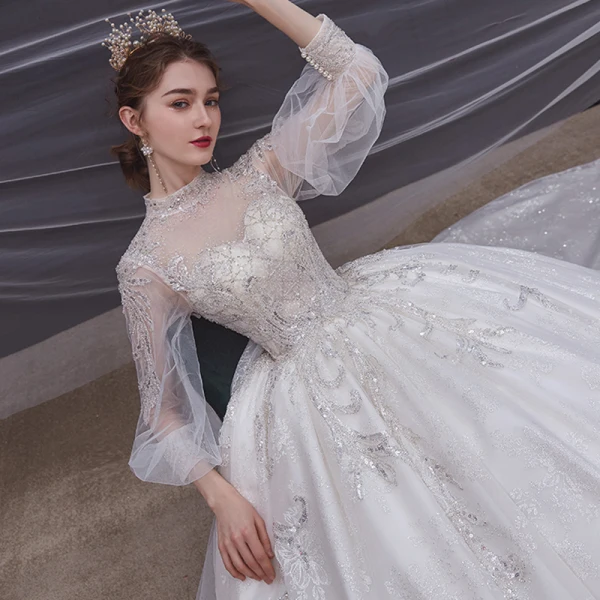 Style Victorien Ivoire Transparentes La Mariée Robe De Mariée 2020 Robe Boule Col Haut Gonflée Manches Longues Dos Nu Appliques Paillettes Perlage Cathedral Train Volants