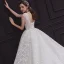 Élégant Champagne La Mariée Robe De Mariée 2020 Robe Boule Col v profond Sans Manches Dos Nu Appliques En Dentelle Perlage Cathedral Train Volants