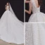 Élégant Champagne La Mariée Robe De Mariée 2020 Robe Boule Col v profond Sans Manches Dos Nu Appliques En Dentelle Perlage Cathedral Train Volants