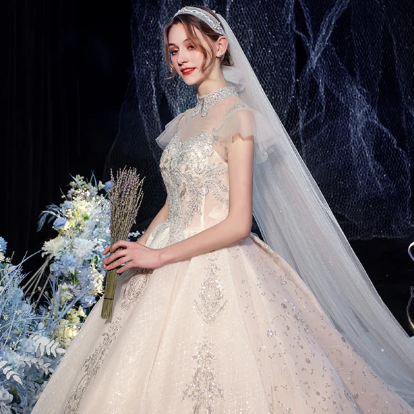 Luxury / Gorgeous Champagne Bridal Wedding Dresses 2020 Ball Gown See-through High Neck Sleeveless Backless Beading Sequins Glitter Tulle Royal Train Ruffle