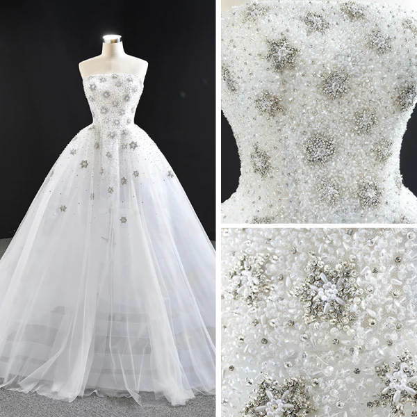 Luxe Blanche La Mariée Robe De Mariée 2020 Robe Boule Bustier Sans Manches Dos Nu Fait main Perlage Train De Balayage Volants