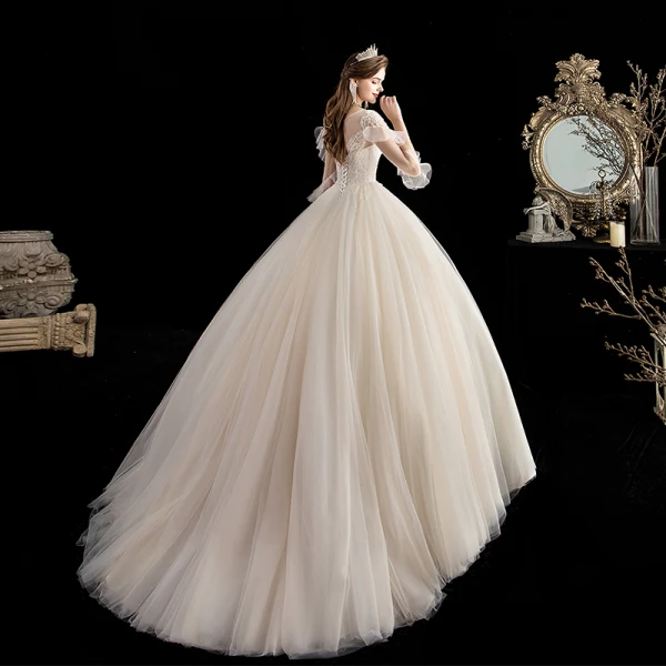 Chic / Belle Champagne La Mariée Robe De Mariée 2020 Robe Boule Transparentes Encolure Dégagée 3/4 Manches Dos Nu Appliques Perlage Train De Balayage Volants