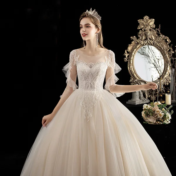 Chic / Belle Champagne La Mariée Robe De Mariée 2020 Robe Boule Transparentes Encolure Dégagée 3/4 Manches Dos Nu Appliques Perlage Train De Balayage Volants