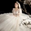Chic / Belle Champagne La Mariée Robe De Mariée 2020 Robe Boule Transparentes Encolure Dégagée 3/4 Manches Dos Nu Appliques Perlage Train De Balayage Volants
