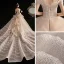 Luxe Champagne La Mariée Robe De Mariée 2020 Robe Boule De l'épaule Manches Courtes Dos Nu Glitter Tulle Perlage Appliques En Dentelle Royal Train Volants
