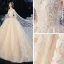 Romantic Champagne Bridal Wedding Dresses 2020 Ball Gown See-through Scoop Neck Short Sleeve Backless Appliques Lace Beading Crystal Cathedral Train Ruffle