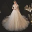Style Victorien Champagne La Mariée Robe De Mariée 2020 Robe Boule Transparentes Encolure Dégagée Gonflée Manches Courtes Dos Nu Perlage Paillettes Chapel Train Volants